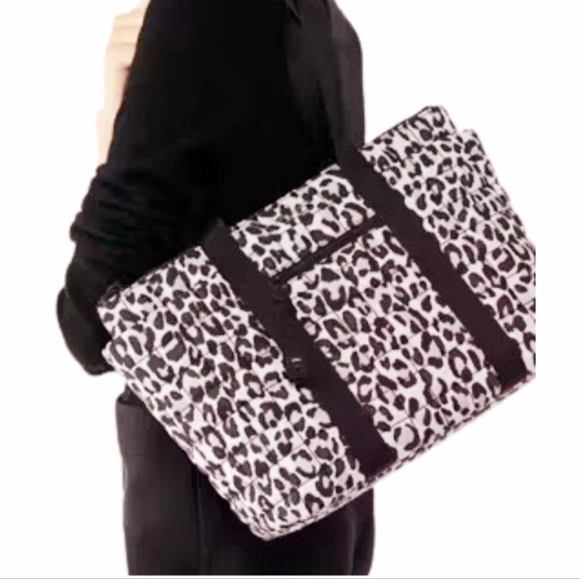 kate spade Handbags - Kate Spade Spotted Purple & Black Leopard Camden
